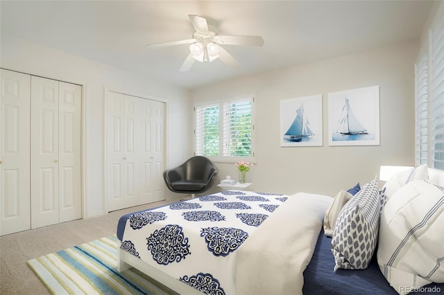 5530 Racquet Ln, Boulder, CO 80303 - carpeted bedroom featuring two closets and ceiling fan