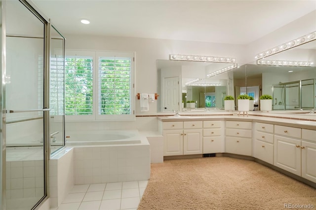 5530 Racquet Ln, Boulder, CO 80303 - bathroom with double vanity, a shower stall, and a garden tub
