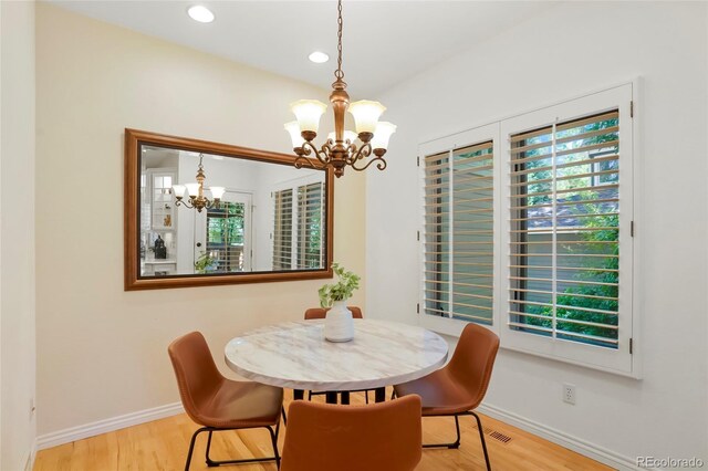 5530 Racquet Ln, Boulder, CO 80303 - dining space with a chandelier, plenty of natural light, wood finished floors, and recessed lighting