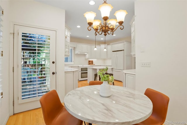 5530 Racquet Ln, Boulder, CO 80303 - dining space featuring a chandelier, light wood-style flooring, and recessed lighting