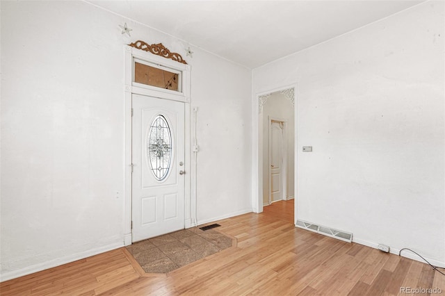 entryway with light hardwood / wood-style flooring