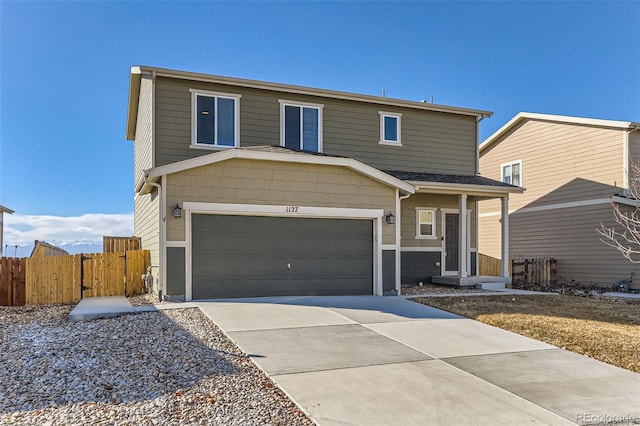 front of property featuring a garage