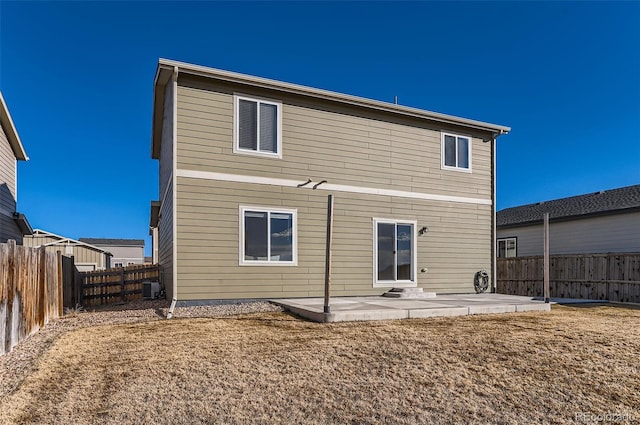 back of house featuring a patio area