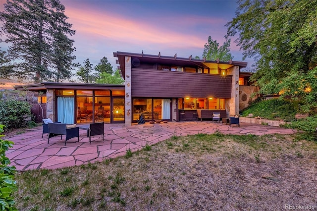 1455 La Mesa St, Colorado Springs, CO 80904 - back of house featuring outdoor lounge area, a patio, and a balcony