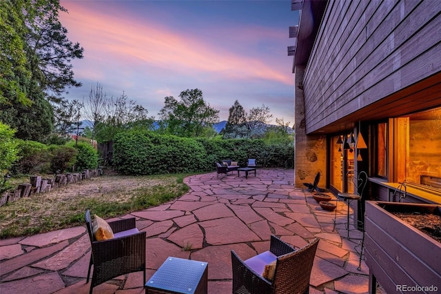 1455 La Mesa St, Colorado Springs, CO 80904 - patio terrace at dusk with a patio