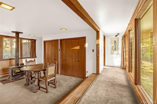 1455 La Mesa St, Colorado Springs, CO 80904 - dining room with a wood stove and carpet