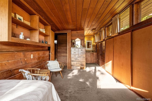 1455 La Mesa St, Colorado Springs, CO 80904 - carpeted bedroom with wooden ceiling, wooden walls, and multiple windows