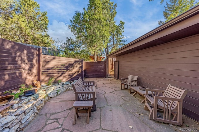 1455 La Mesa St, Colorado Springs, CO 80904 - fenced backyard with a patio area