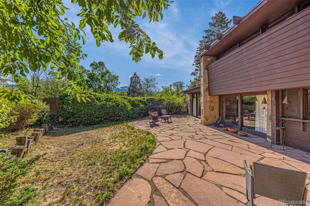 1455 La Mesa St, Colorado Springs, CO 80904 - fenced backyard featuring a patio
