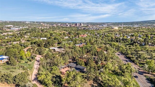 1455 La Mesa St, Colorado Springs, CO 80904 - aerial view of property and surrounding area featuring a tree filled landscape