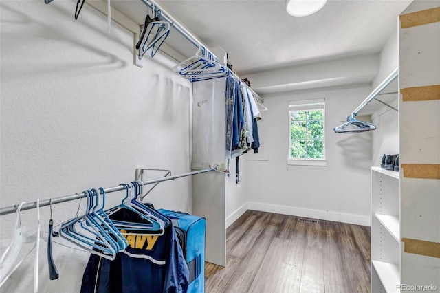 10609 Abilene St, Commerce City, CO 80022 - spacious closet featuring wood finished floors