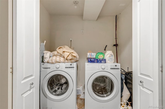 10609 Abilene St, Commerce City, CO 80022 - washroom with washer and clothes dryer