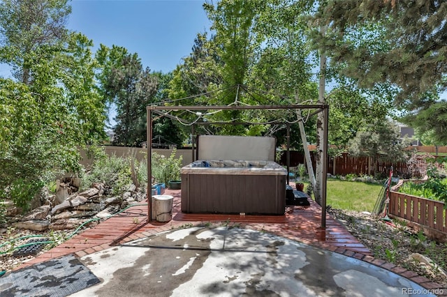 10609 Abilene St, Commerce City, CO 80022 - fenced backyard featuring a hot tub, a gazebo, a patio area, and a deck