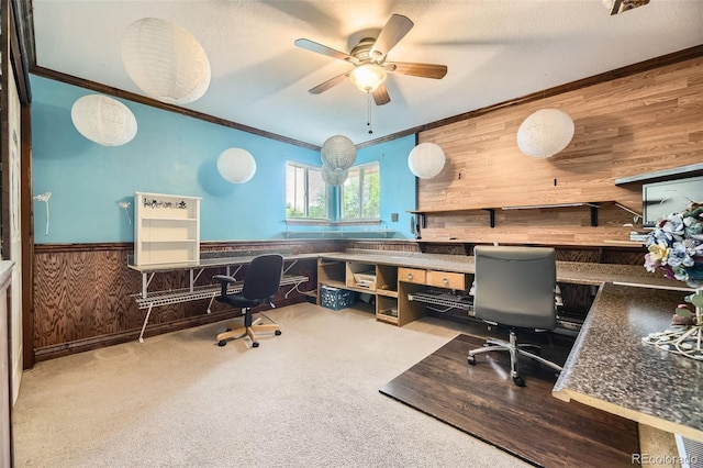 6072 Pierson Ct, Arvada, CO 80004 - carpeted office space featuring wood walls, ornamental molding, a ceiling fan, and wainscoting
