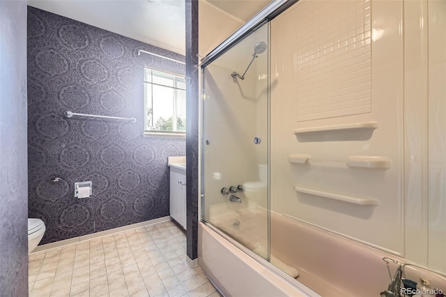 6072 Pierson Ct, Arvada, CO 80004 - full bathroom with wallpapered walls, shower / bath combination with glass door, and vanity