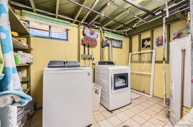 6072 Pierson Ct, Arvada, CO 80004 - washroom with water heater, washer and dryer, and light tile patterned floors