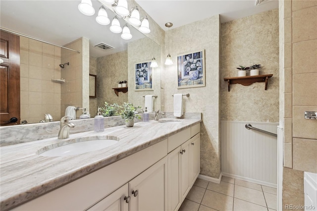 3298 S Krameria St, Denver, CO 80222 - bathroom with tile patterned floors, double vanity, and a shower