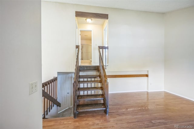 9642 W Chatfield Ave Unit A, Littleton, CO 80128 - stairs with wood finished floors
