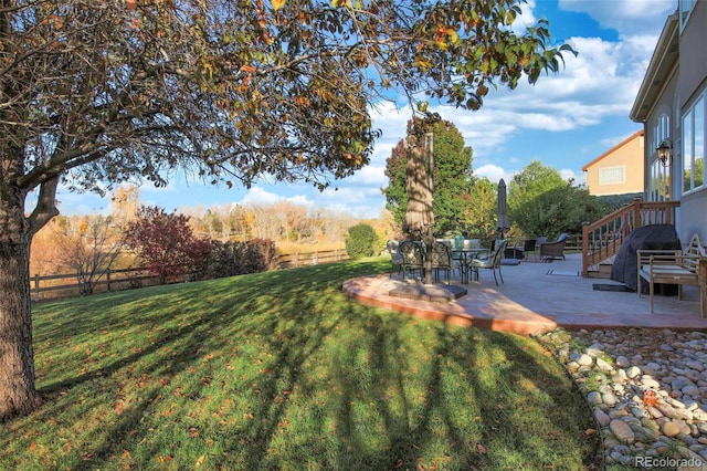 view of yard with a patio area and fence