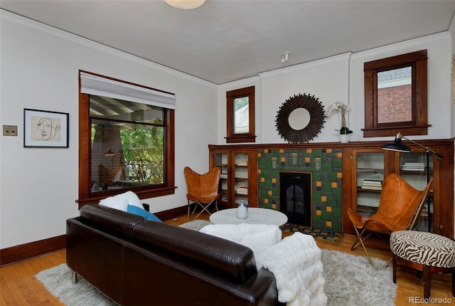 3237 N Josephine St, Denver, CO 80205 - living room featuring crown molding and wood finished floors