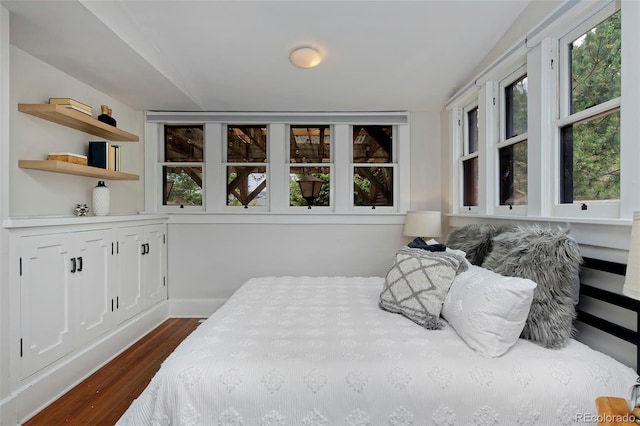 3237 N Josephine St, Denver, CO 80205 - bedroom featuring dark wood-style flooring and baseboards