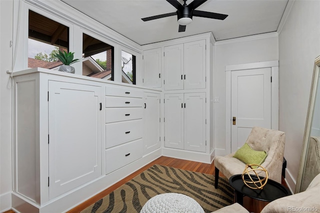 3237 N Josephine St, Denver, CO 80205 - sitting room featuring wood finished floors, a ceiling fan, and crown molding