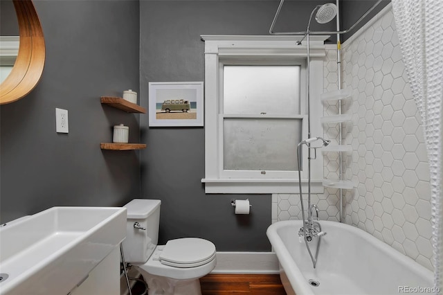 3237 N Josephine St, Denver, CO 80205 - bathroom featuring wood finished floors and vanity