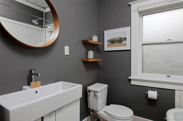 3237 N Josephine St, Denver, CO 80205 - bathroom featuring toilet and a sink