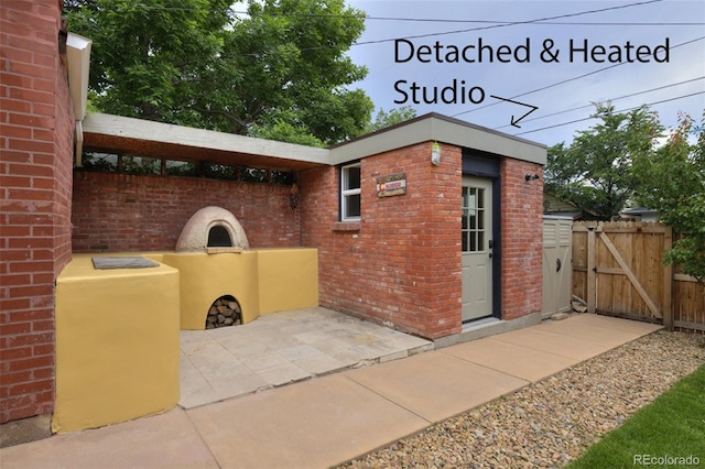 3237 N Josephine St, Denver, CO 80205 - view of patio / terrace featuring a gate