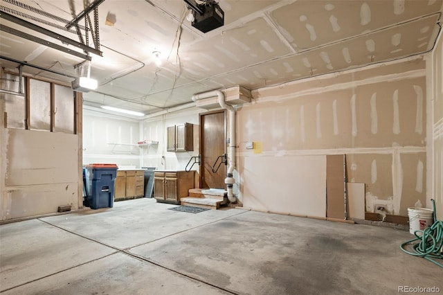 garage featuring a garage door opener