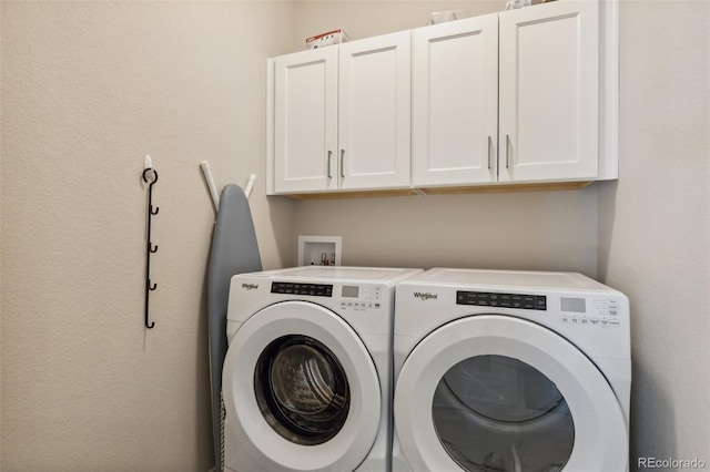 763 Sage Forest Ln, Monument, CO 80132 - laundry area featuring cabinet space and separate washer and dryer