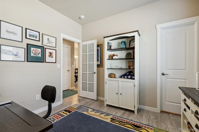 763 Sage Forest Ln, Monument, CO 80132 - office with french doors, light wood-type flooring, and baseboards
