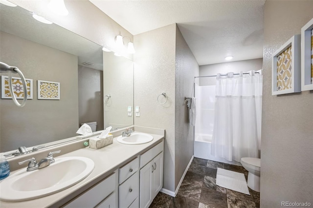 full bath with a sink, toilet, double vanity, and shower / tub combo with curtain