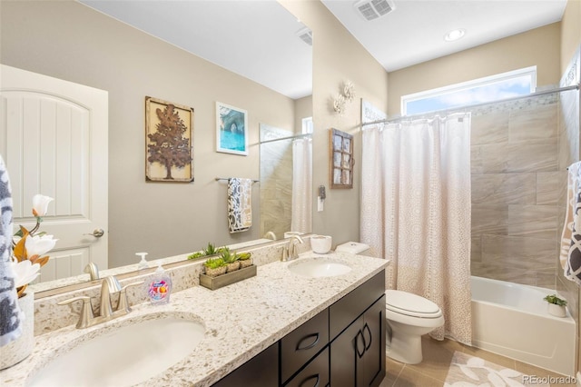 10057 Des Moines St, Parker, CO 80134 - bathroom with toilet, tile patterned floors, shower / bath combo, and double vanity