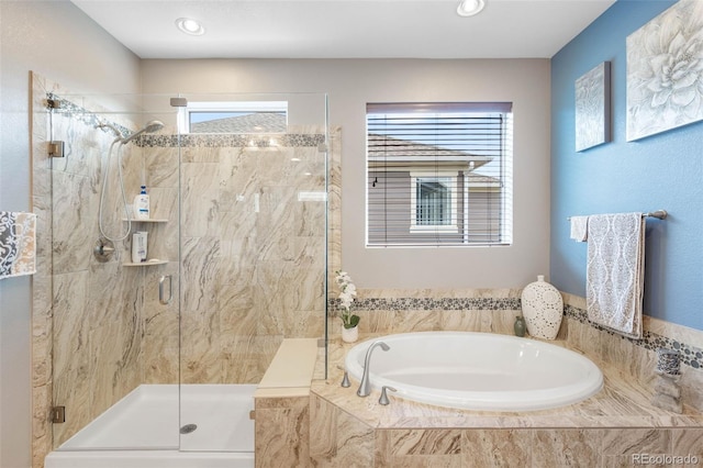 10057 Des Moines St, Parker, CO 80134 - full bath featuring a garden tub, healthy amount of natural light, and a stall shower