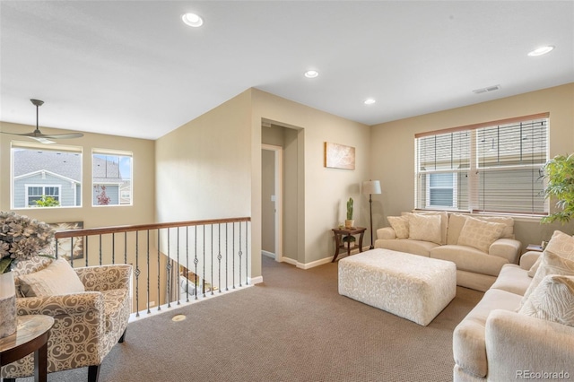 10057 Des Moines St, Parker, CO 80134 - living room with carpet floors, a ceiling fan, baseboards, and recessed lighting