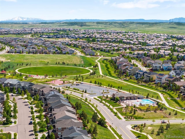 10057 Des Moines St, Parker, CO 80134 - aerial view of residential area with mountains and a pool