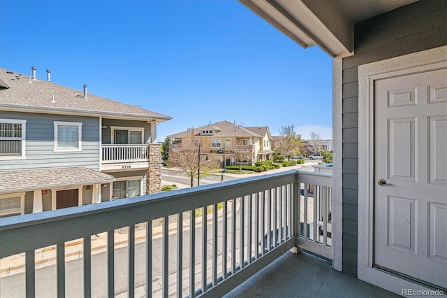 balcony featuring a residential view