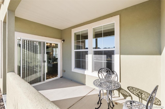 view of patio / terrace with a balcony