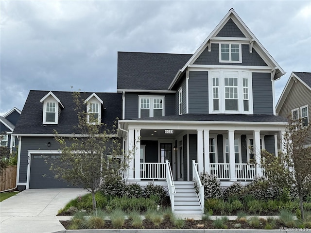 6023 Chester Way, Denver, CO 80238 - view of front facade featuring a porch, concrete driveway, a garage, and a shingled roof