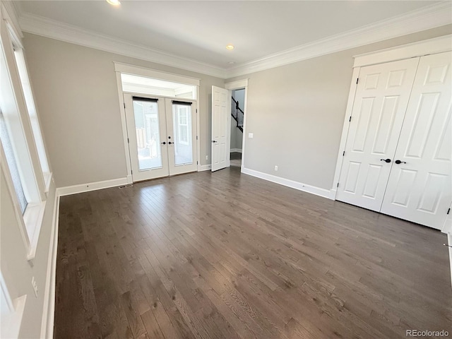 6023 Chester Way, Denver, CO 80238 - unfurnished bedroom featuring french doors, dark wood-style flooring, crown molding, baseboards, and recessed lighting