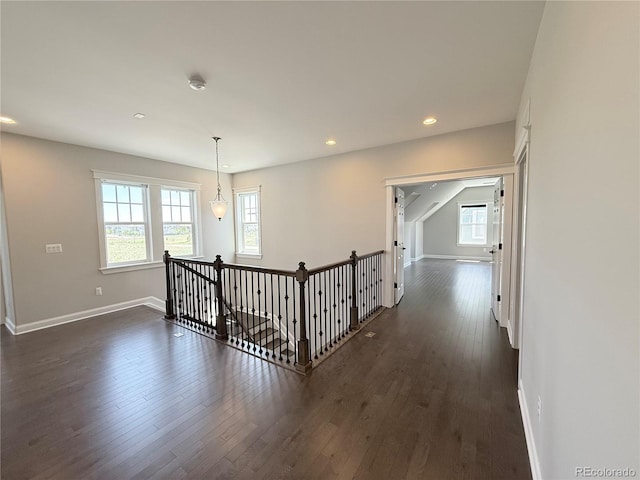 6023 Chester Way, Denver, CO 80238 - corridor featuring an upstairs landing, dark wood-style flooring, recessed lighting, and baseboards