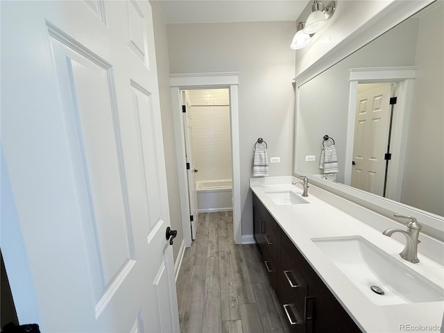 6023 Chester Way, Denver, CO 80238 - bathroom with double vanity and wood finished floors