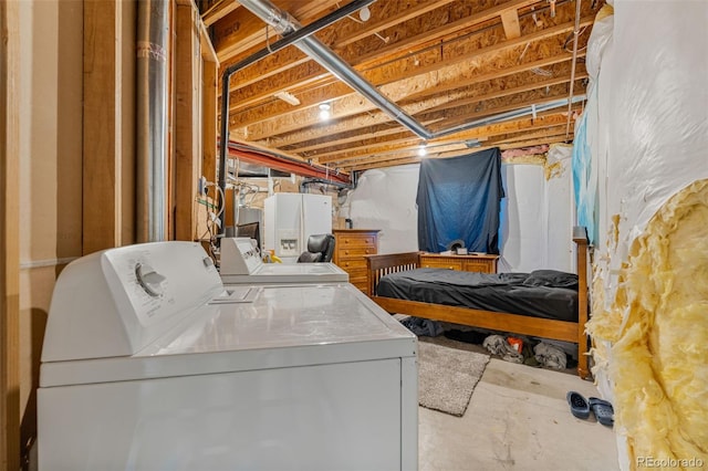 24022 E Jamison Dr, Aurora, CO 80016 - unfinished below grade area with washing machine and dryer and white refrigerator with ice dispenser