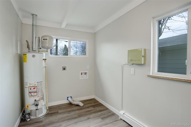 clothes washing area with laundry area, a baseboard radiator, hookup for an electric dryer, light wood-type flooring, and gas water heater