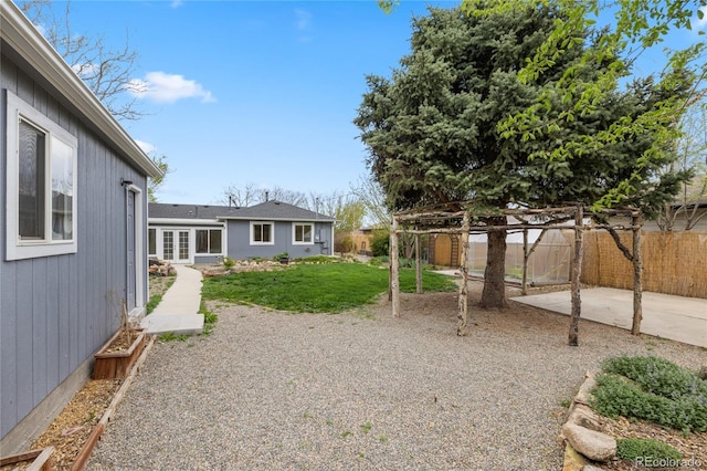 view of yard featuring fence