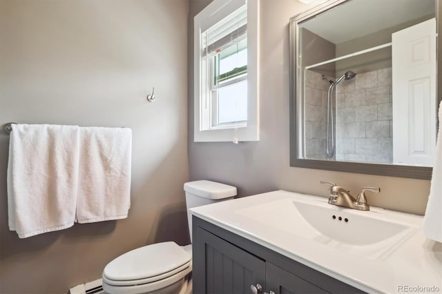 full bathroom with vanity, a baseboard radiator, toilet, and a shower