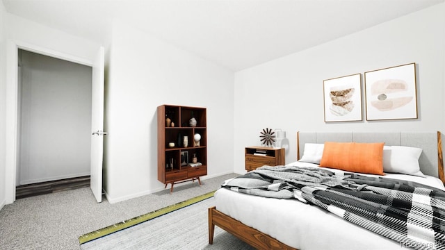 bedroom featuring carpet and lofted ceiling