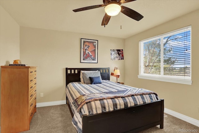 7631 Oak St, Arvada, CO 80005 - carpeted bedroom featuring baseboards and ceiling fan