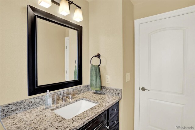 7631 Oak St, Arvada, CO 80005 - bathroom featuring vanity